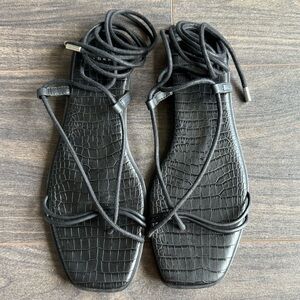 Black lace-up sandals